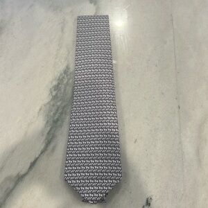 BNWT Silk Jim Thompson elephant design tie. Blue/gray.